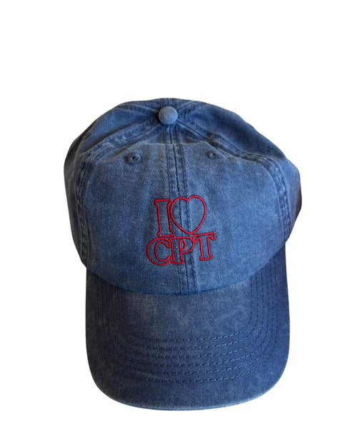Blue denim cap with red 'I ❤️ CPT' embroidery on a cap - The Perfect Cape Town Souvenir
